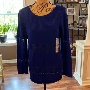 Chelsea and Theodore size large blue sweater with open knit panels